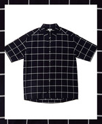 클래식한 윈도페인 체크를 입힌 넉넉한 실루엣의 셔츠 가격미정 코스 제품.